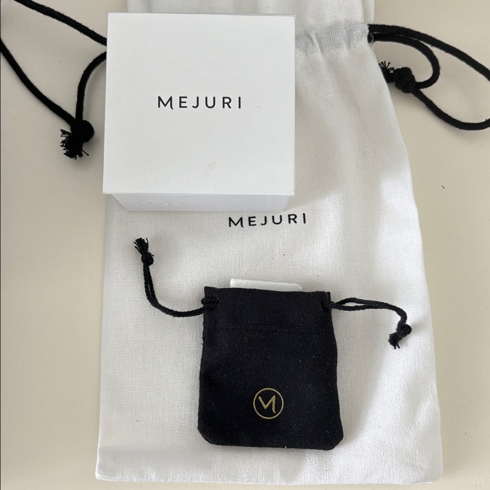Mejuri White Box and Jenny Bird Black Box